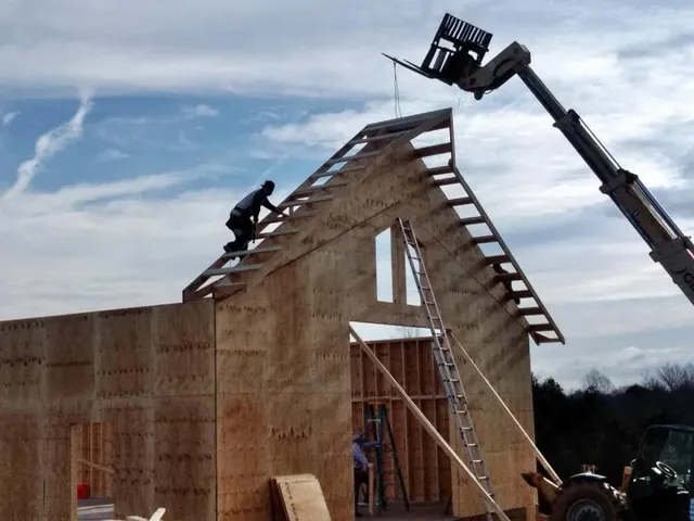 Modern Style Barn Construction Progress — photograph 5