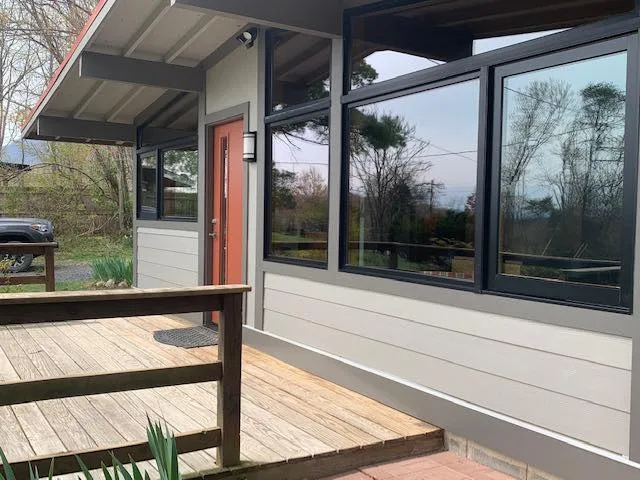 Custom Home  Window and siding replacement — photograph 10